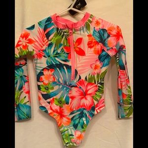 Tropical flower long sleeve swimsuit for minimal sun exposure. Gently used